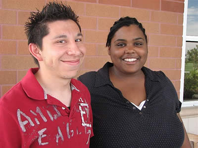 Two smiling WHCL students